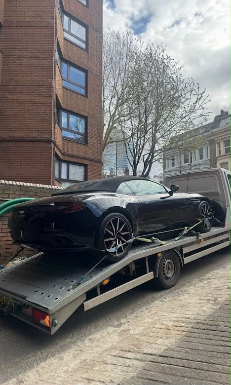 Aston Martin convertible on flatbed